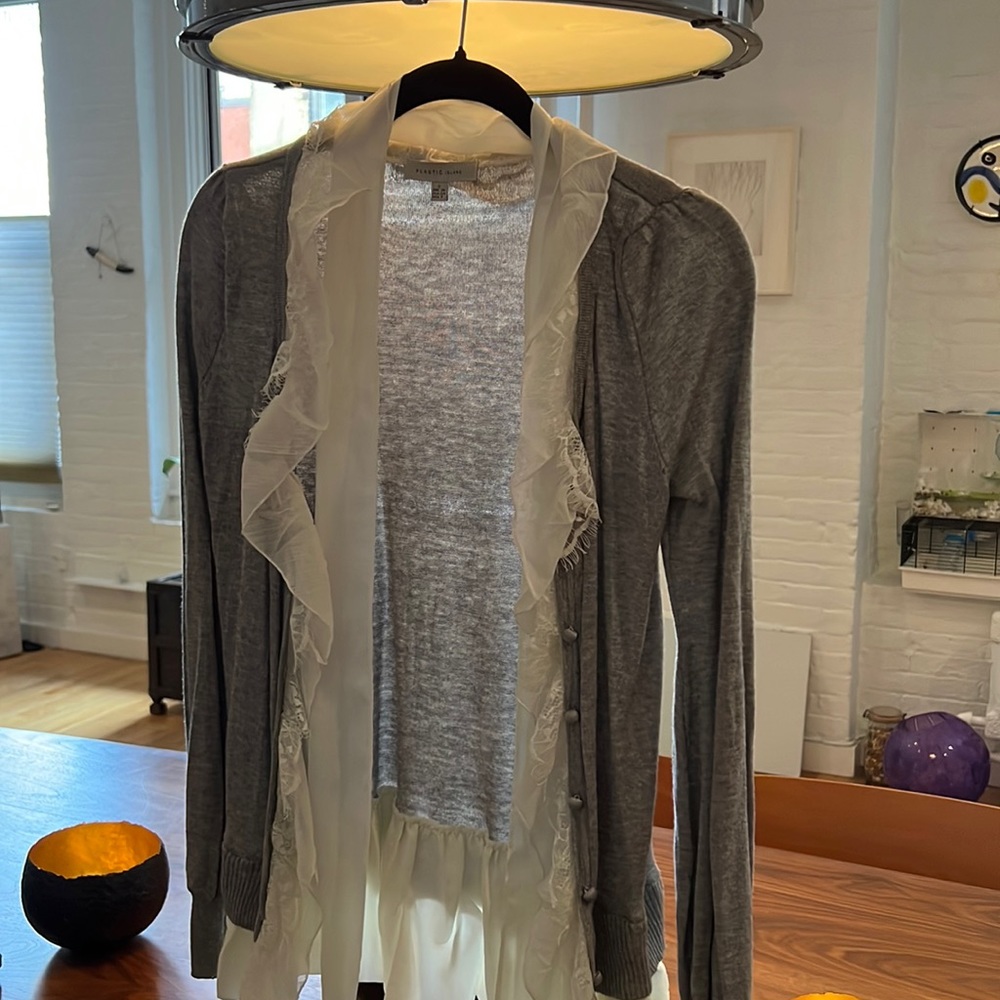 Feminine frilly blouse/cardigan in light gray